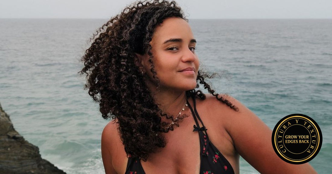 Afro-Latina woman with defined coily curls by the coast, Grow Your Edges Back Cultura y Textura