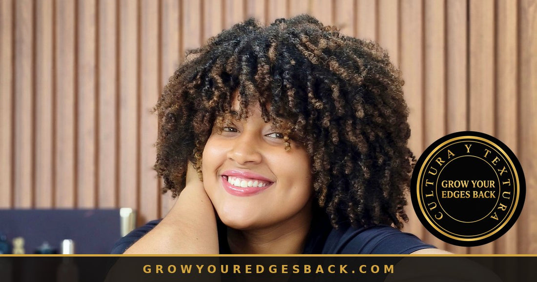 Woman with natural curly hair smiling in a salon - Grow Your Edges Back