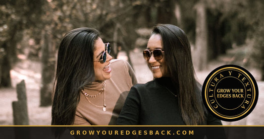Two women embracing warmly, celebrating natural hair - Grow Your Edges Back