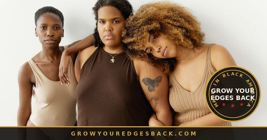 Confident Black woman with a full natural afro outdoors - Grow Your Edges Back