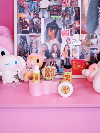 Grow Your Edges Back products displayed on Leila Rose's pink vanity